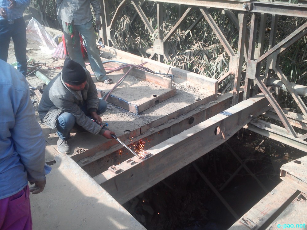 A broken bridge in Maarkhulen area in the  Jiribam-Silchar National Highway 37  :: January 1 2016