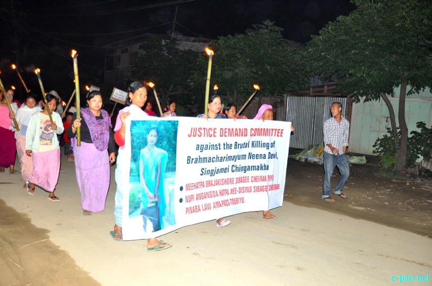 Womenfolk taking out a torch rally at Singjamei, Chingmakha, demanding justice to Brahmacharimayum Neena :: 9 May 2013