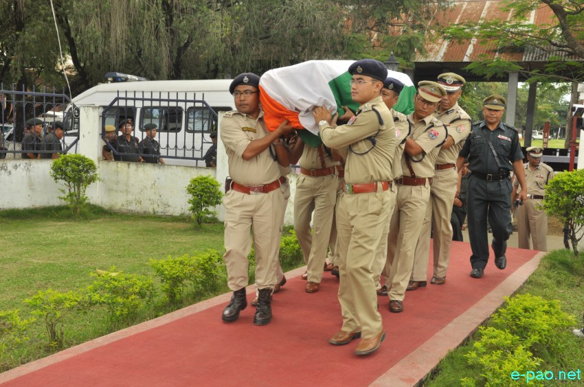 Tributes to slain commando, KS Thotyo, who died in an ambush at Nungshangkong,  at 1st Manipur Rifles complex :: 10 September 2014