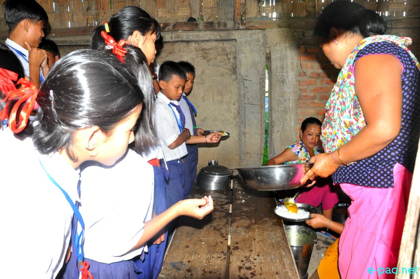 Primary School Children receiving Mid day meal at Praja High School, Lamshang :: 12th September 2013
