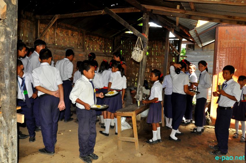 Primary School Children receiving Mid day meal at Praja High School, Lamshang :: 12th September 2013