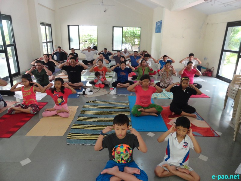 1st International Day of Yoga celebrated by AMAND, Pune at  Wanawadi, Pune :: 21 June 2015