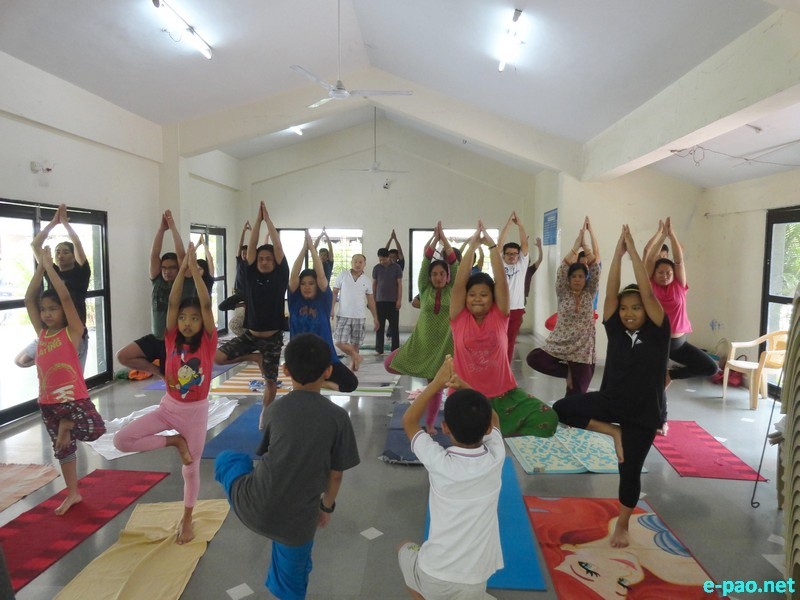 1st International Day of Yoga celebrated by AMAND, Pune at  Wanawadi, Pune :: 21 June 2015 