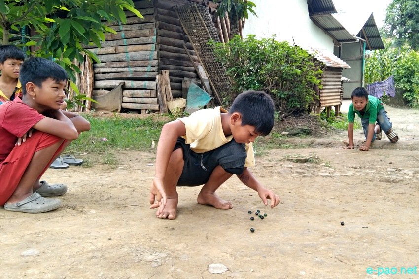 Thri Kappi (Marbol Sannaba) : A popular game played by children using marbles at Andro :: 25 July 2021