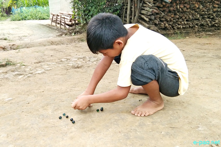 Thri Kappi (Marbol Sannaba) : A popular game played by children using marbles at Andro :: 25 July 2021
