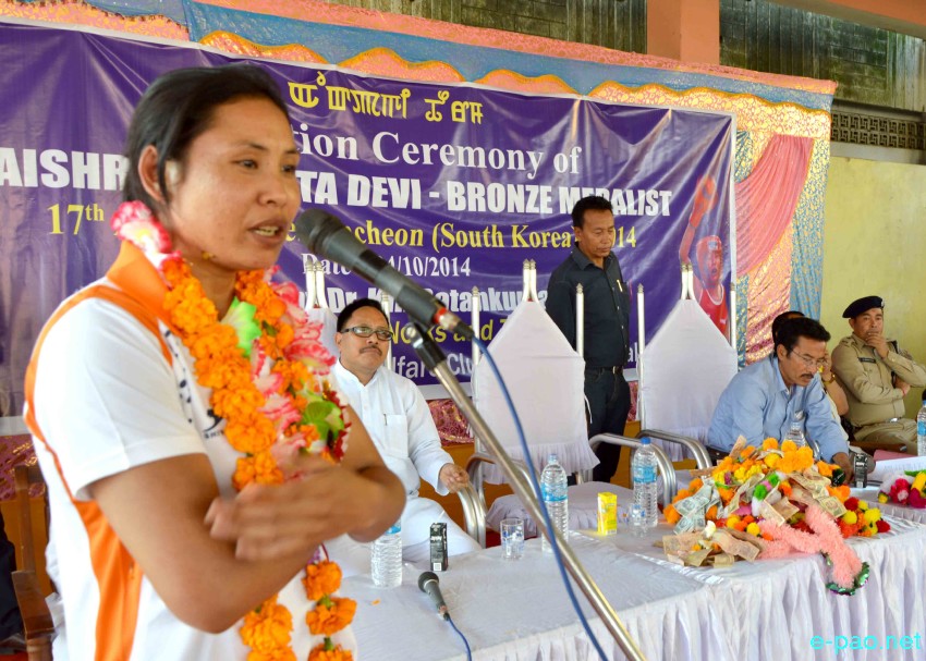 Laishram Sarita - International Boxer - being welcomed at her home town of Mayang Imphal on October 4 2014 after her return from the 17 Asian Games at Incheon , South Korea  
