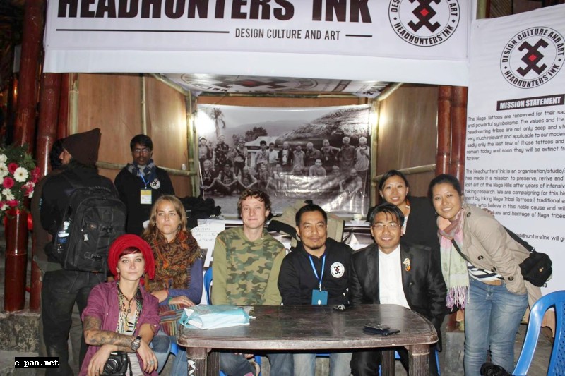 Mo Naga with a few visitors and artists who participated in his tattoo revival programme