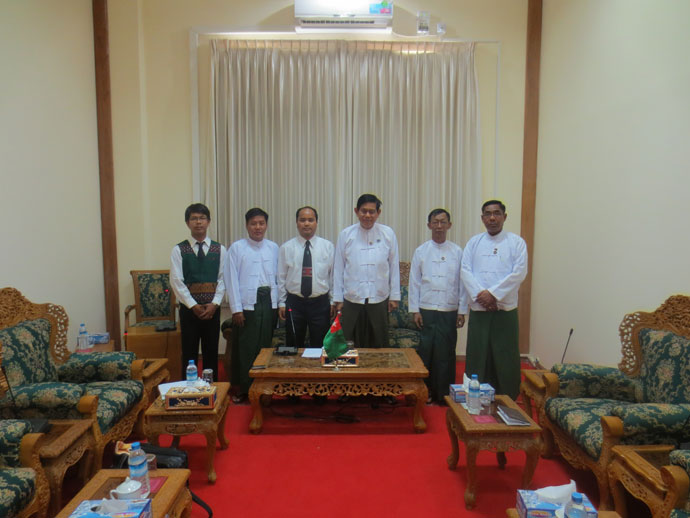 With U Htay Oo (tallest in the middle), Member of Parliament and Vice-Chairman of the ruling Union Solidarity and Development Party (USDP) and other officials at party headquarters in Myanmar's capital Naypyitaw on February 25, 2014