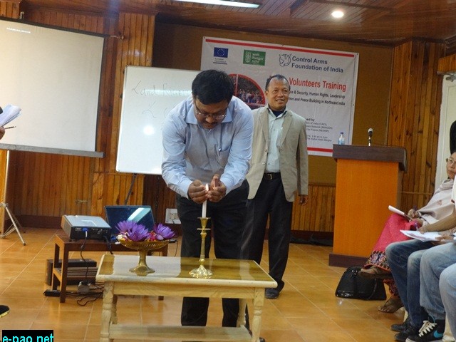   Mr. RK Bobichand, Director, Change and Peacebuilding Action, lightening the candle at 25-26 March 2014 Peace Volunteer Training Workshop in Manipur