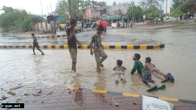 Relieve from hot weather by a rainfall in Delhi for a moment on 13th July 2014