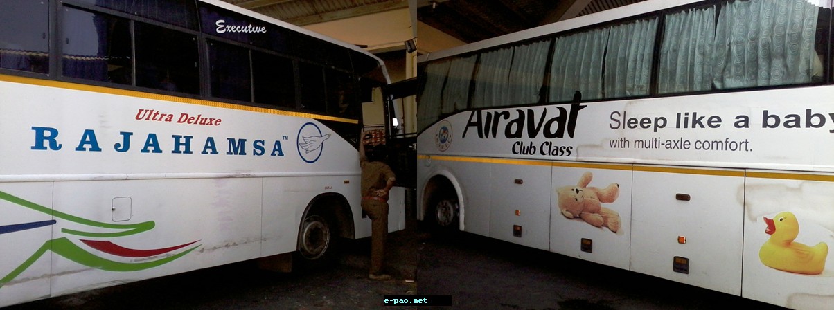  A KSRTC bus stand, designated bus stop, ultra comfort Volvo bus and ultra deluxe bus in Mysore.