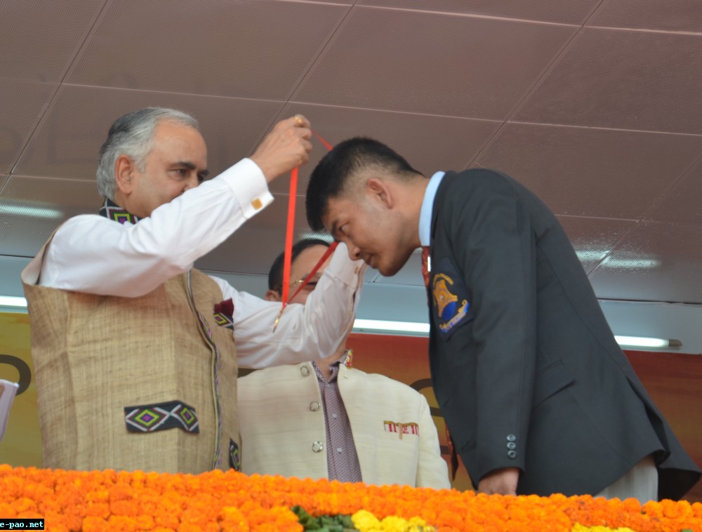 Dr. K. Romeo Meetei receiving the award from  Governor of Arunachal Pradesh on 21st Feb 2015 