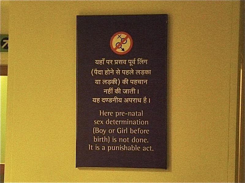 Sign posted in a New Delhi hospital stating that pre-natal sex determination is a crime