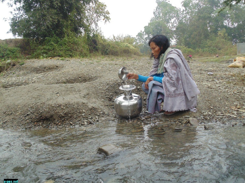 Fetching water with bowl