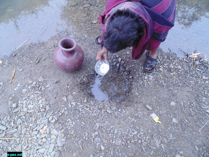 Fetching water with bowl