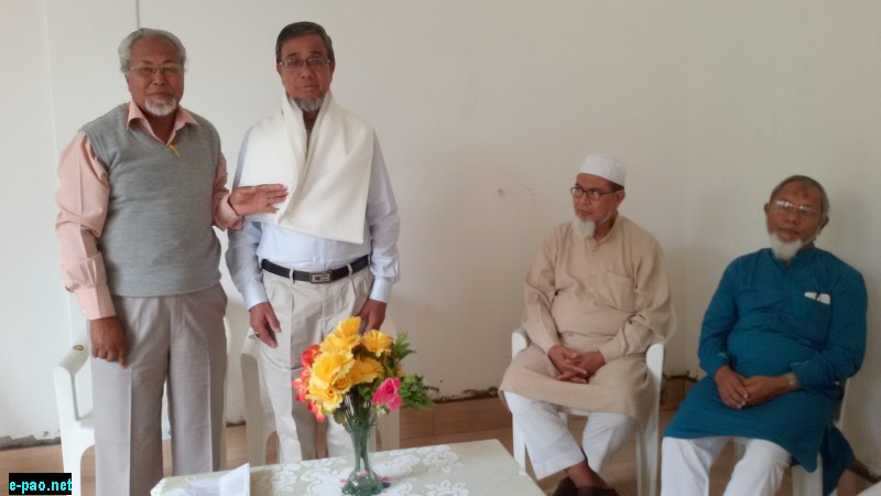  Prof. M.A. Janab Khan felicitating Mohd. Sahid Chowdhury at Hafiz Hatta, in Imphal, on May 11, 2015.  