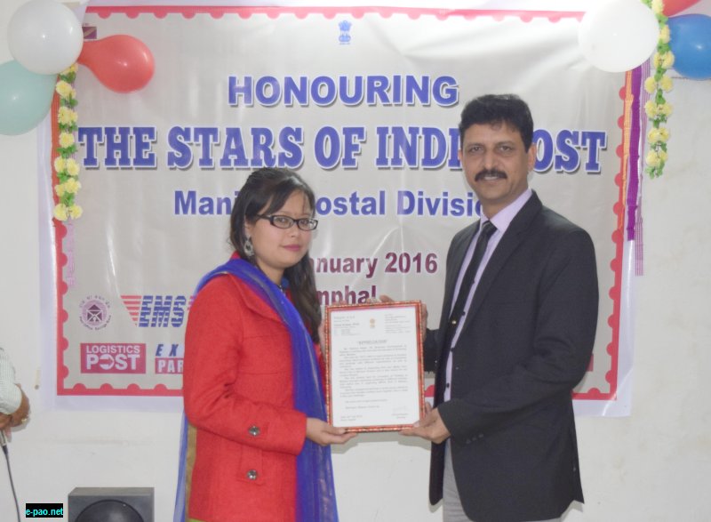 Vinod Kumar Director Manipur presenting appreciation to Ms Homeshori Devi