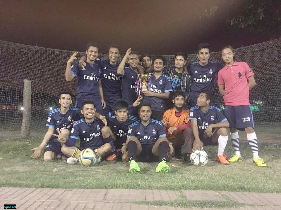 AL-Ameen football club posed with the trophy