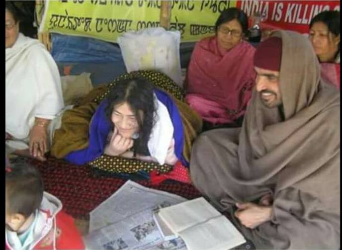 Photo 4. Faisal Khan (sitting in the front wearing maroon colour skull cap) taking part in protest with Irom Sharmila (Source: facebook page of Faisal Khan).   