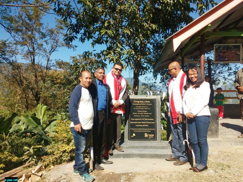  Representatives of PwC India, Habitat for Humanity and RNBA stand beside the Foundation stone, dedicating the 51 reconstructed houses and Community Centre to the residents of Tamenglong District in Manipur who were affected by the 2016 earthquake