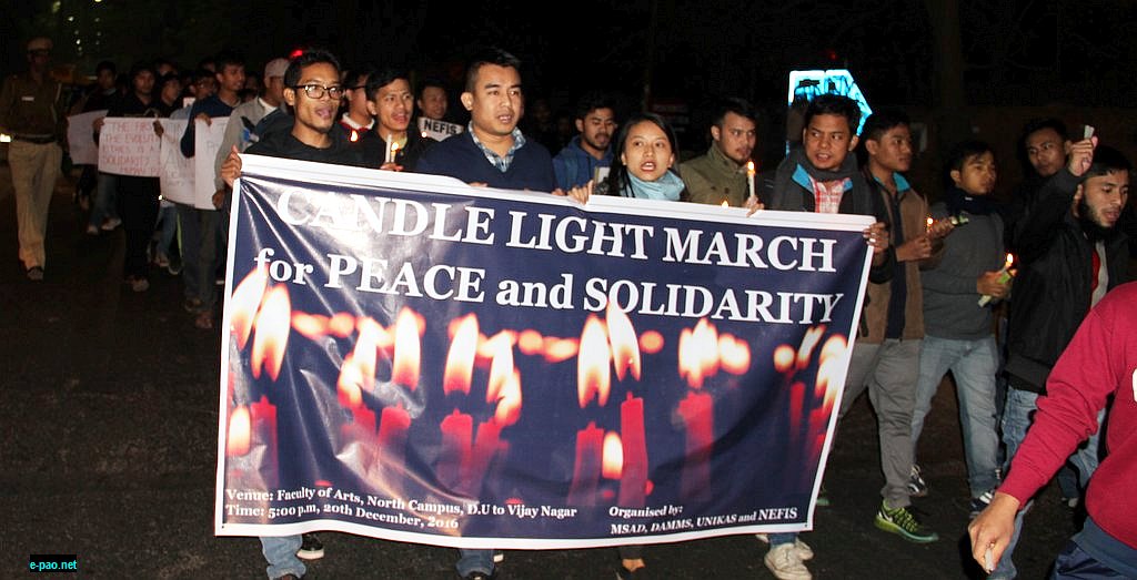 Candle light at DU for peace and harmony among different communities