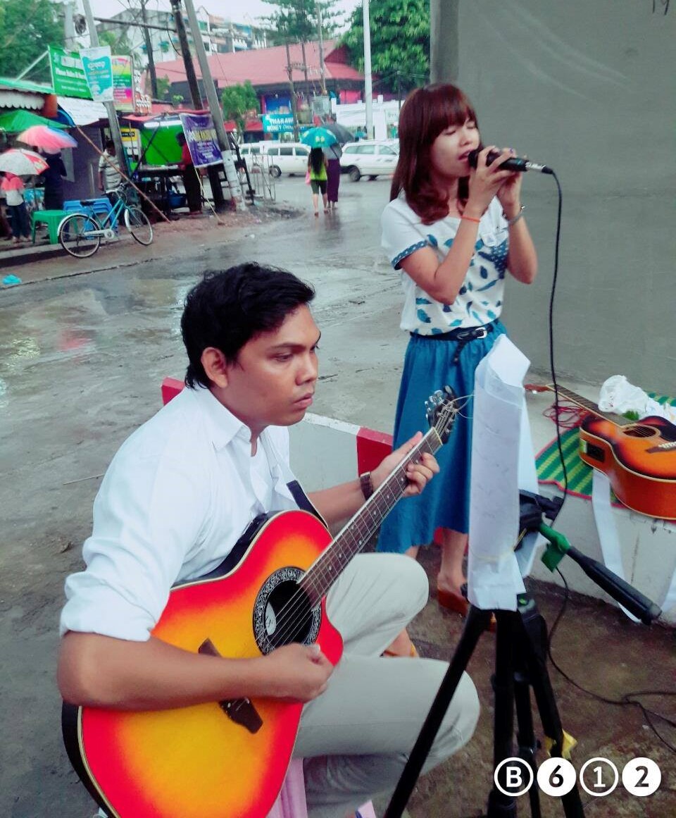 A Myanmar Meetei leisabi singing romantic song 'sandi myint lwin' ( still in love) somewhere in Yangon.