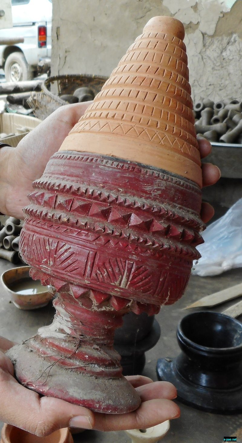 Nganthak Awumba - An intricately hand engraved item placed at the top of the hookah, generally used by the royal class and influential lots in the past