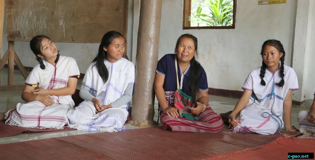 An adept listening of Karen young girls to an elder's sharing on Karen cultures and way of life at Huay E-Khang village, Northern Thailand, 8 September 2016 