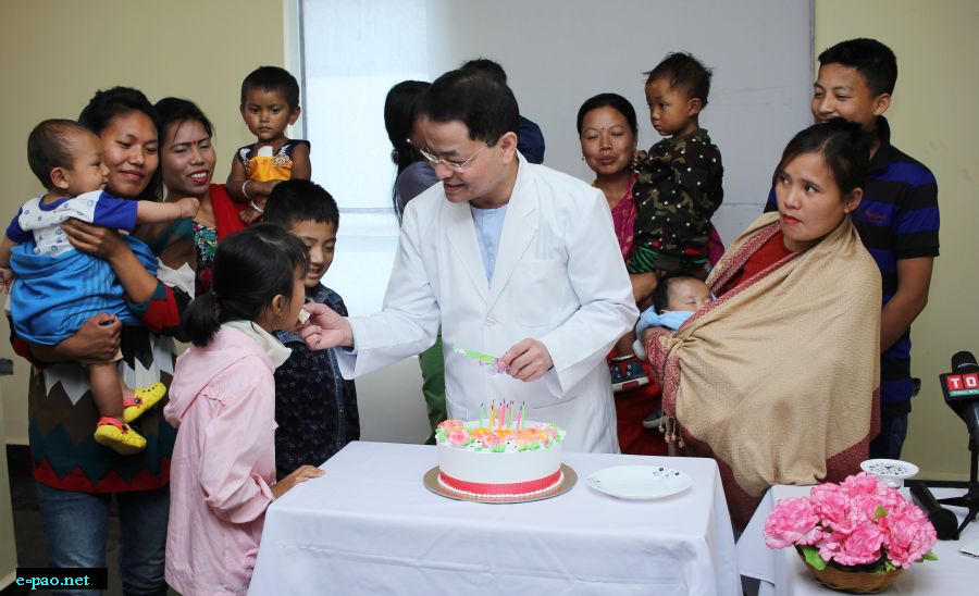  Dr L Shyamkishore with happy patients and parents cutting cake celebrating the new life of children after Surgery 