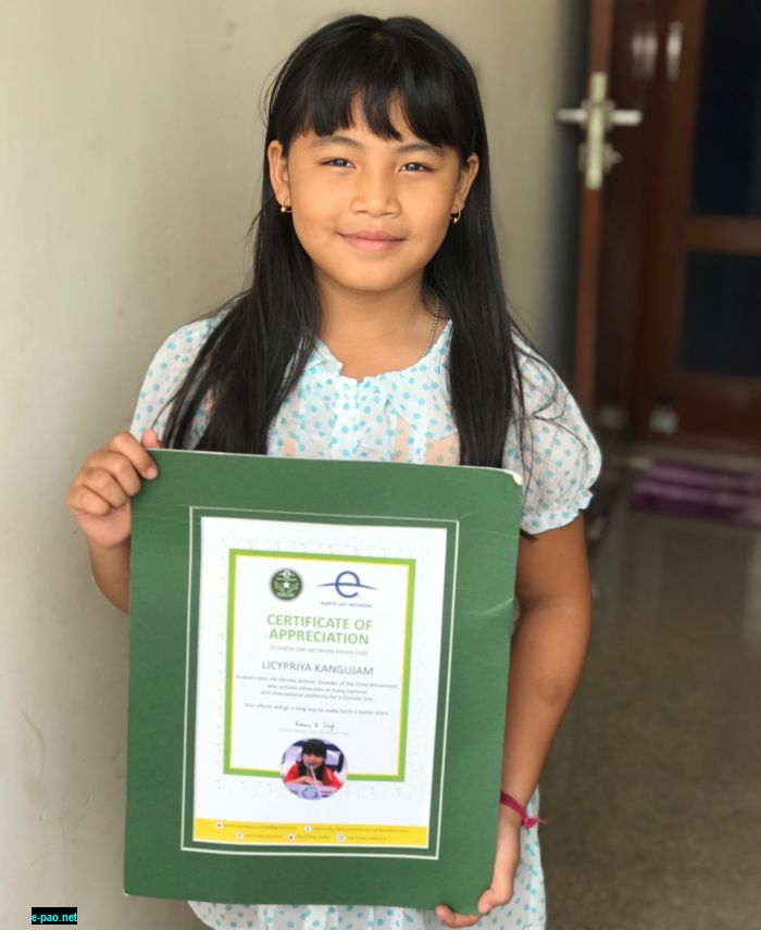  Licypriya posing with the Earth day Network Rising Star recognition certificate in her residence. She received it via post 