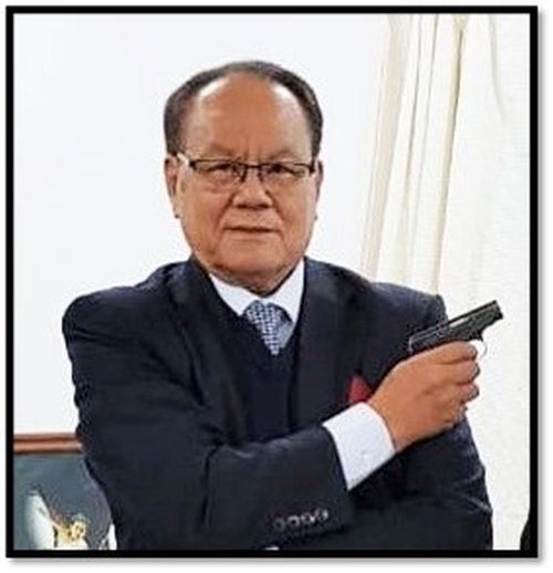  Author reliving with his old semiautomatic pistol in November 2019 In Imphal 