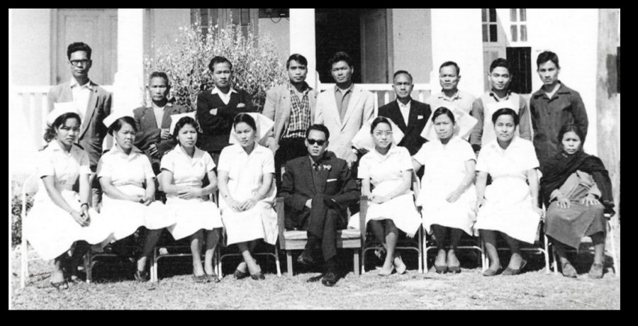  Staff of Churachand District Hospital. Author (centre). On his (R) Staff Nurse Chingnu ; On his (L) Staff Nurse Manu 
