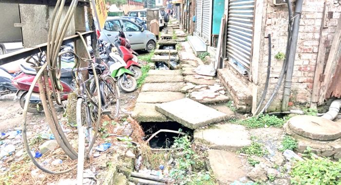 Footpaths along Governor Road in shambles