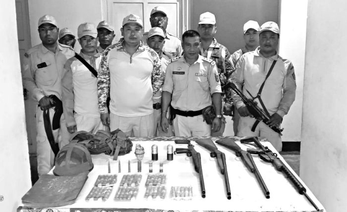 Three UGs held, arms recovered, WWII bomb defused