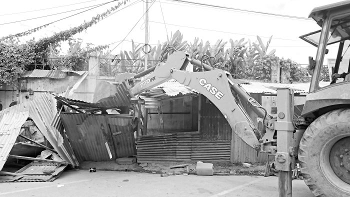 Unauthorised structures dismantled, locals protest
