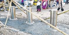 Road blocker being installed on Mall Road