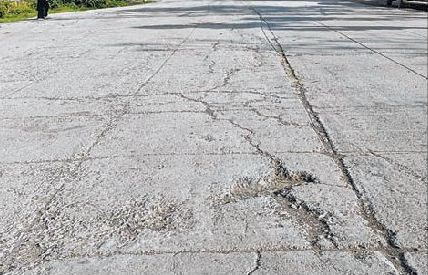 Cracks begin to adorn cement concrete road