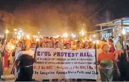 Torch rally in Langathel condemns killing of children and civilians
