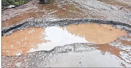 Blacktopped in March but now...NH-2 filled with crater-sized potholes