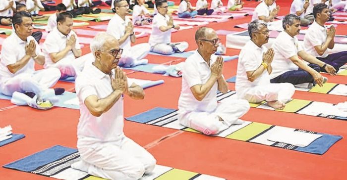 Bhalla leads Yoga Day observance