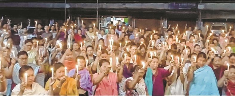 Candlelight vigils demand justice for six Naga victims