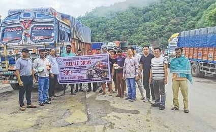 Stir lifted but hundreds of goods laden trucks still stranded on both NHs