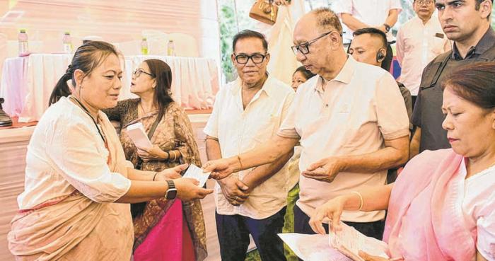 Acknowledging PM's 25 years of public service...CM distributes PMFME subsidies
